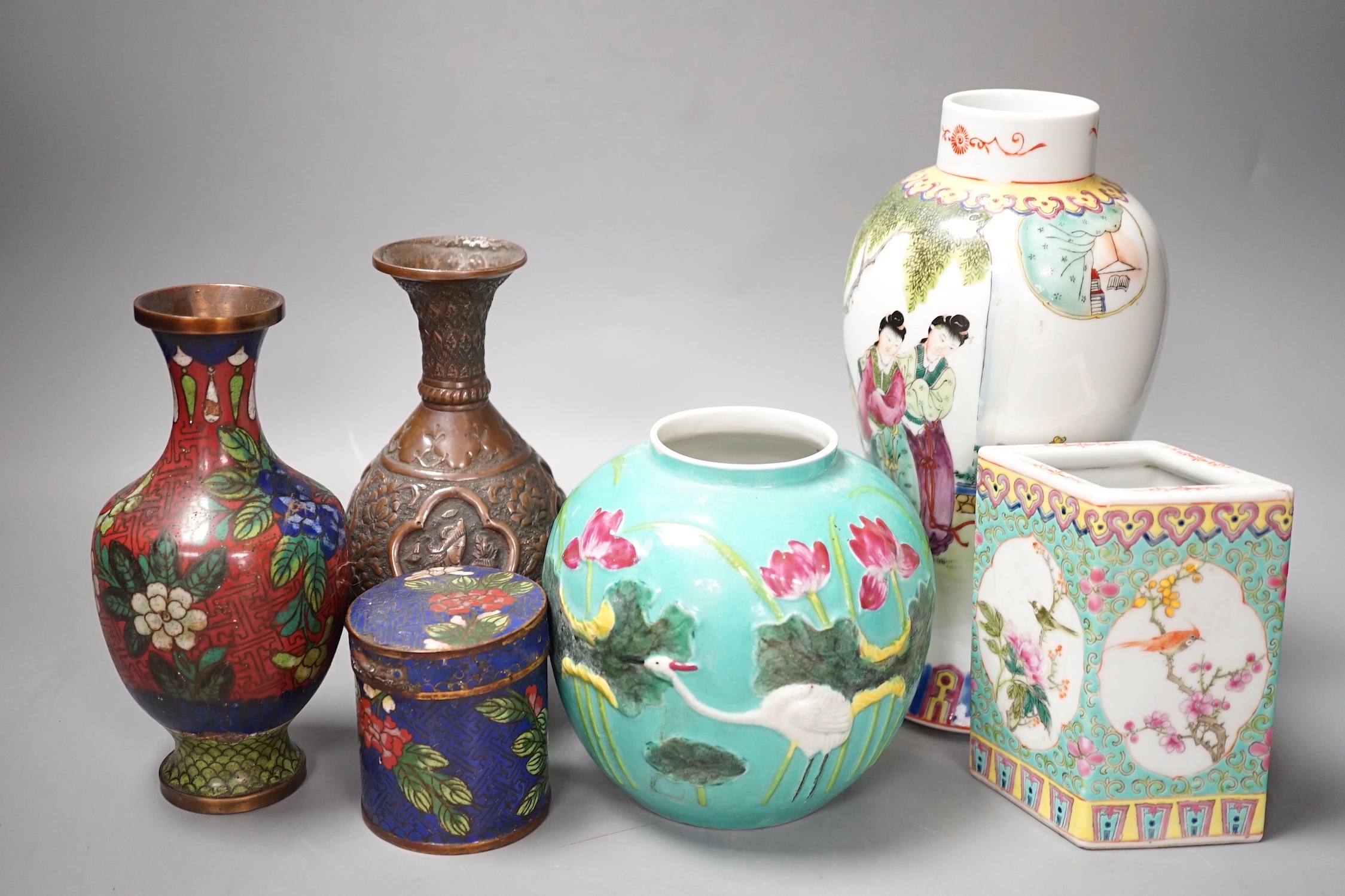 A group of Chinese porcelain vases, a cloisonné enamel vase and pot and a Middle Eastern metal vase, tallest 23 cm